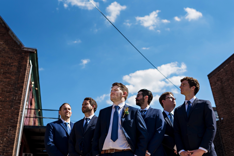 A cool portrait of a groom and his groomsmen in Philadelphia.